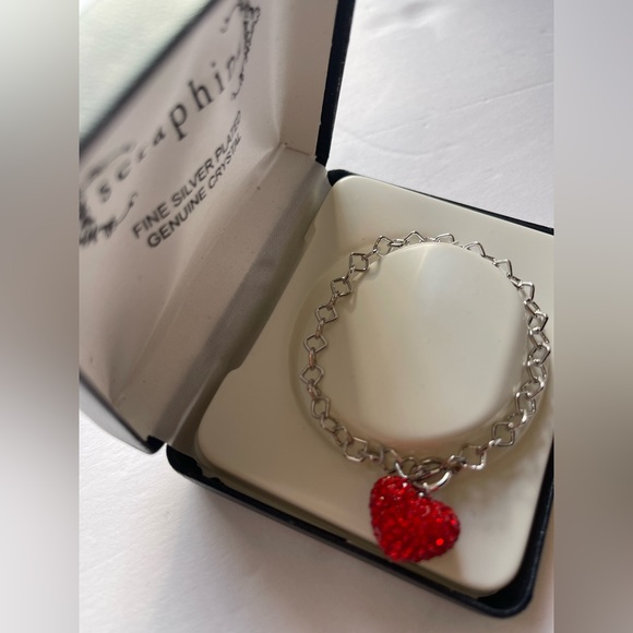 Seraphina Jewelry - Seraphina Silver plated bracelet with red. ♥️ heart